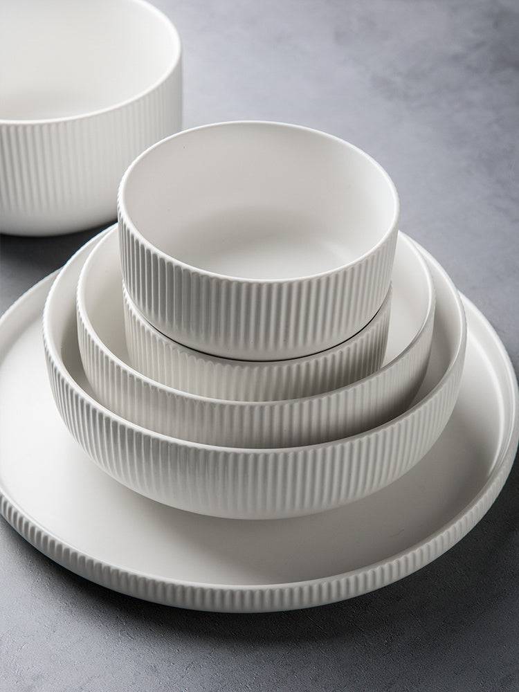 Hualian Yijia Plate Dish Set featuring stacked white ribbed plates and bowls.